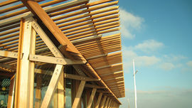 Deal Pier Cafe, 2008, Niall McLaughlin Architects. The project will use sustainable and low carbon resources as a priority, with timber also having a warm aesthetic which will weather well over time into the nautical context of the dock.